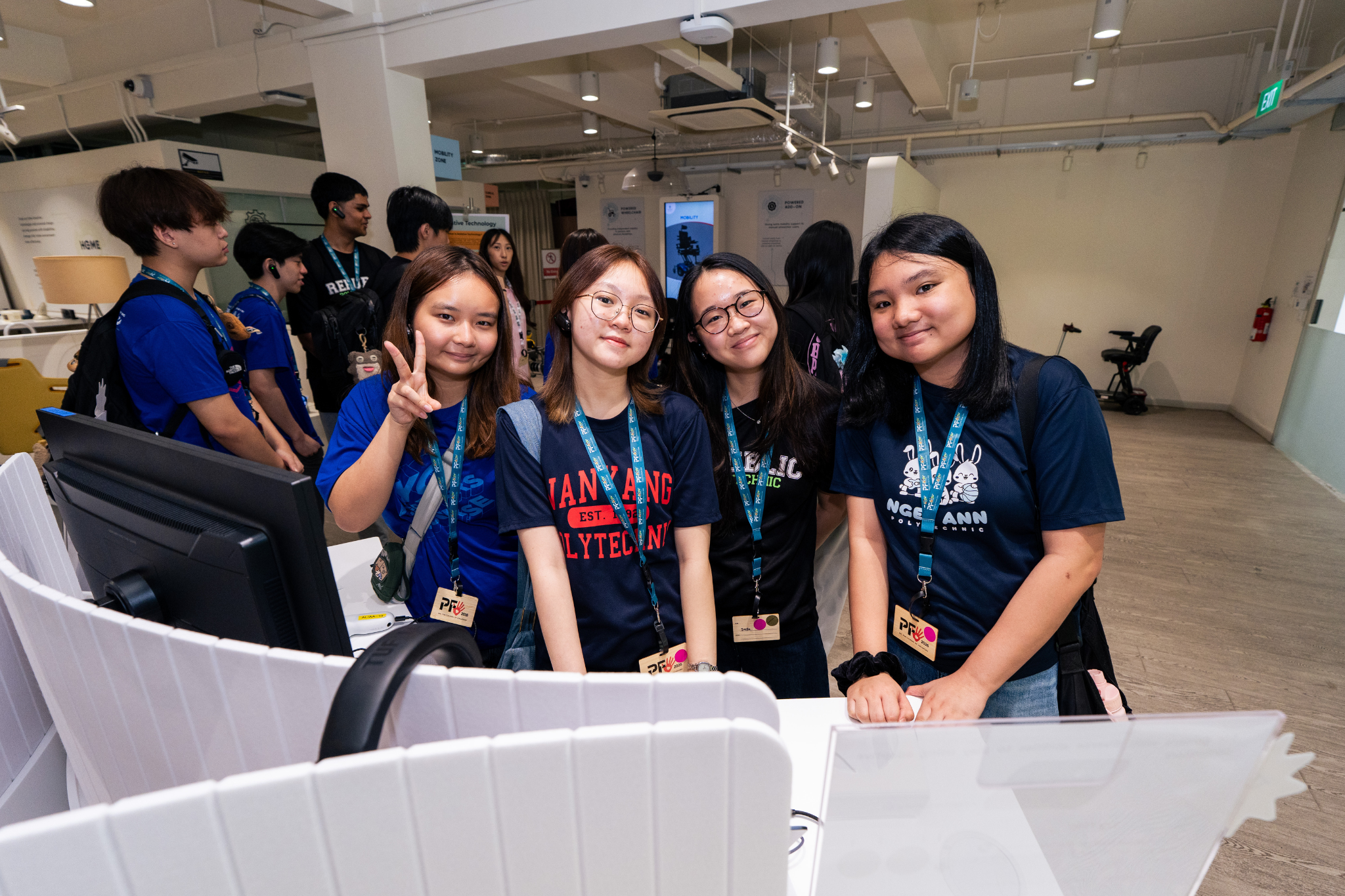 Student delegates pose for a photo during their learning journey at Enabling Village as part of Polytechnic Forum 2026.